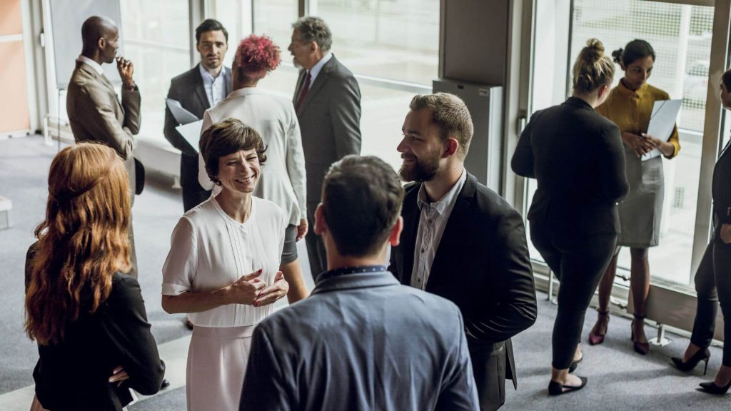 people talking at an event